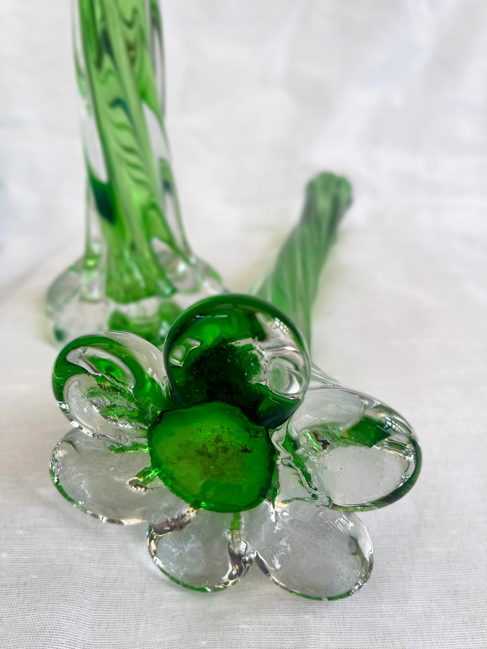 A pair of Uranium green French vintage twist stem vases. Art glass flower sleeves, circa 1950.