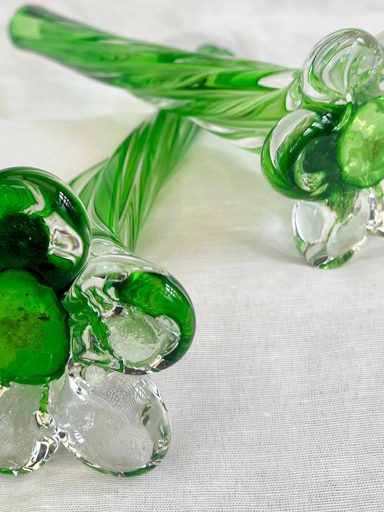 A pair of Uranium green French vintage twist stem vases. Art glass flower sleeves, circa 1950.