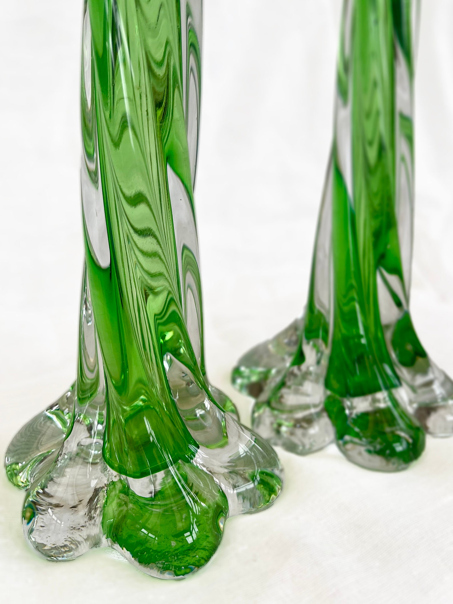 A pair of Uranium green French vintage twist stem vases. Art glass flower sleeves, circa 1950.