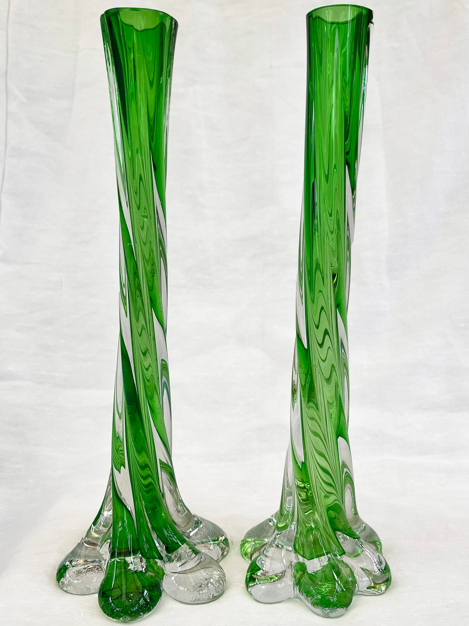 A pair of Uranium green French vintage twist stem vases. Art glass flower sleeves, circa 1950.