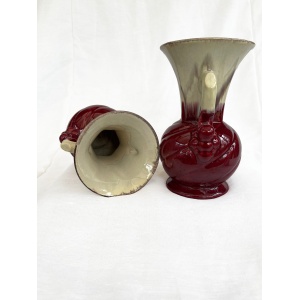 An attractive pair of Mid century fat lava glaze German handled vases