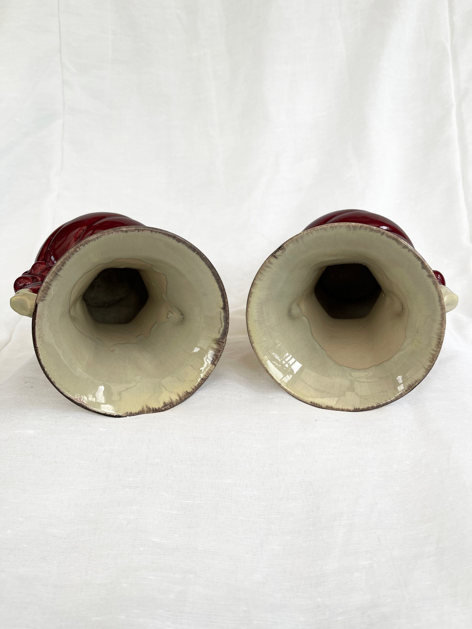 An attractive pair of Mid century fat lava glaze German handled vases