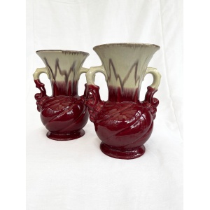 An attractive pair of Mid century fat lava glaze German handled vases