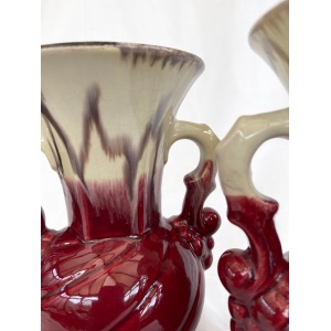 An attractive pair of Mid century fat lava glaze German handled vases