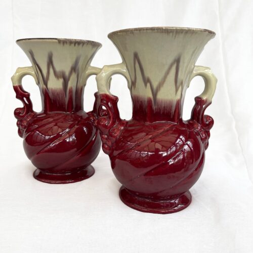An attractive pair of Mid century fat lava glaze German handled vases