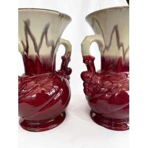 An attractive pair of Mid century fat lava glaze German handled vases