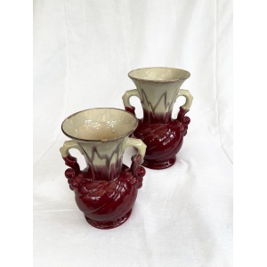 An attractive pair of Mid century fat lava glaze German handled vases