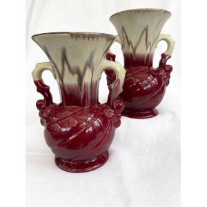An attractive pair of Mid century fat lava glaze German handled vases