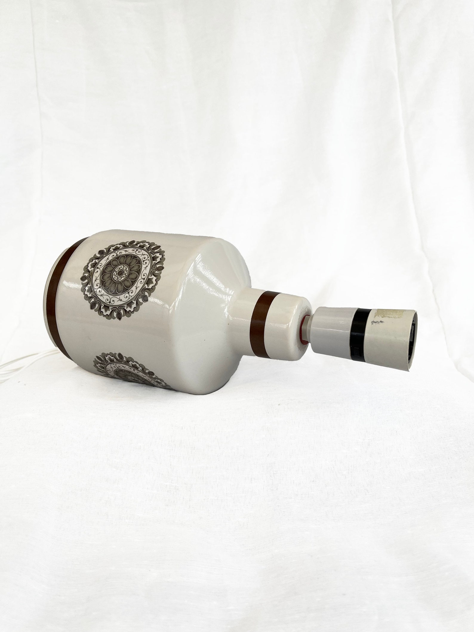 Mid century ceramic table lamp circe 1960's with geometric stylised floral print, with boucle lampshade