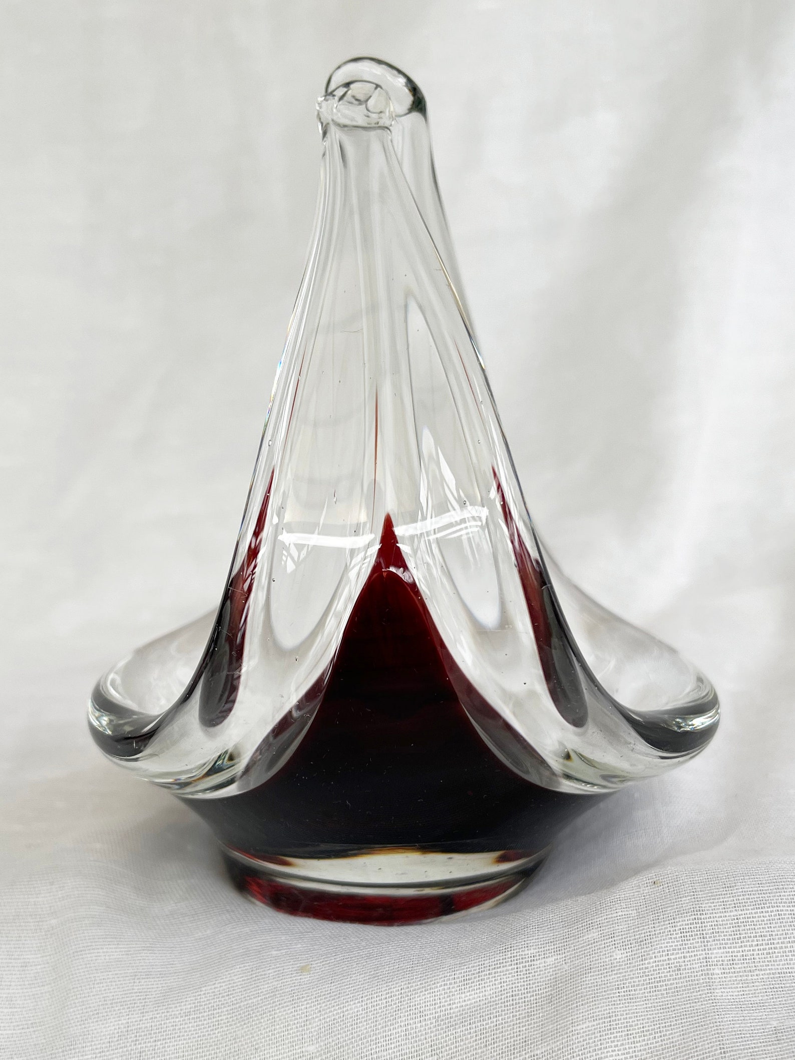 Mid-Century Modern spun and stretched burgundy red glass sculpture/basket/bowl/dish