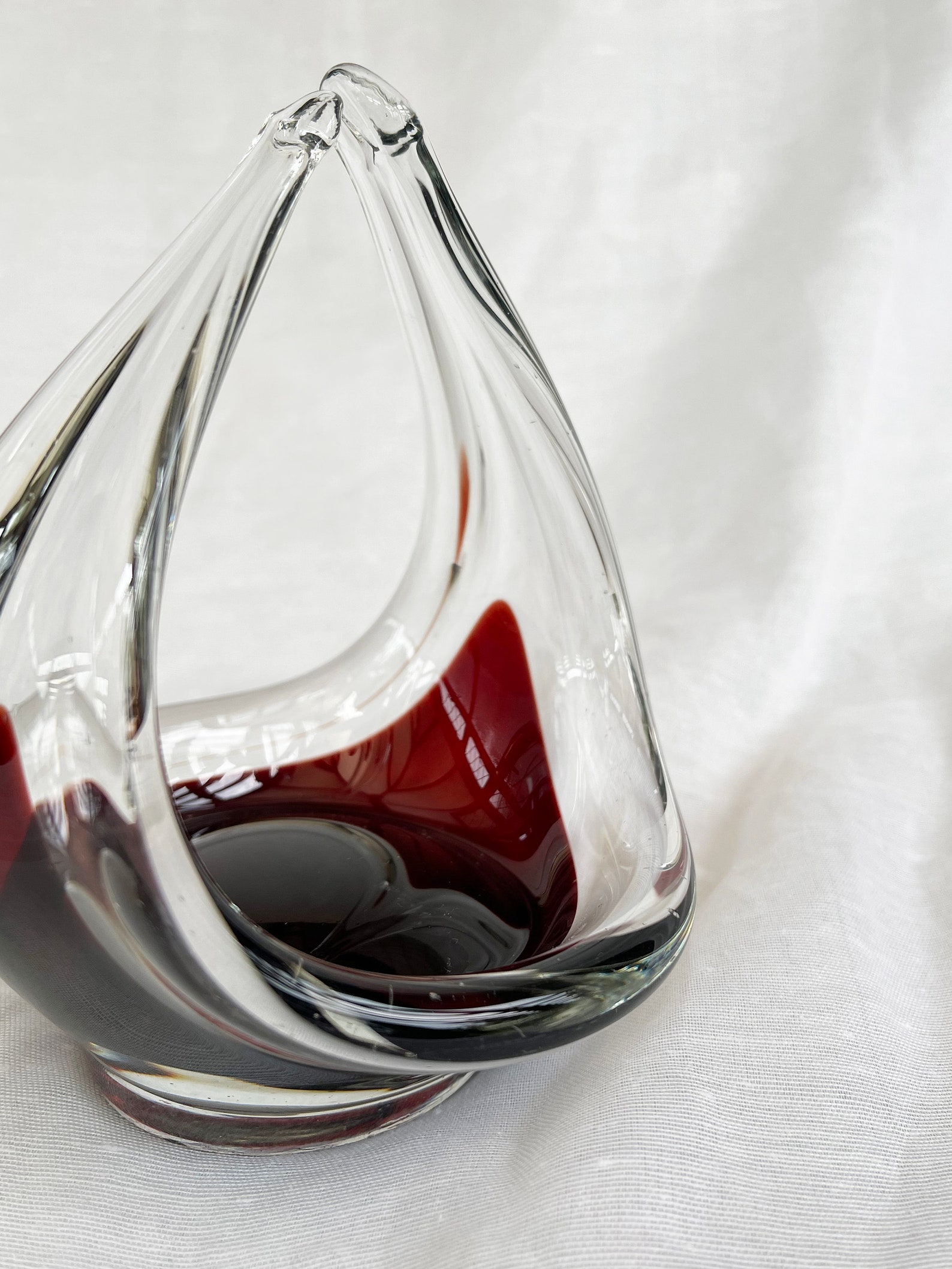 Mid-Century Modern spun and stretched burgundy red glass sculpture/basket/bowl/dish