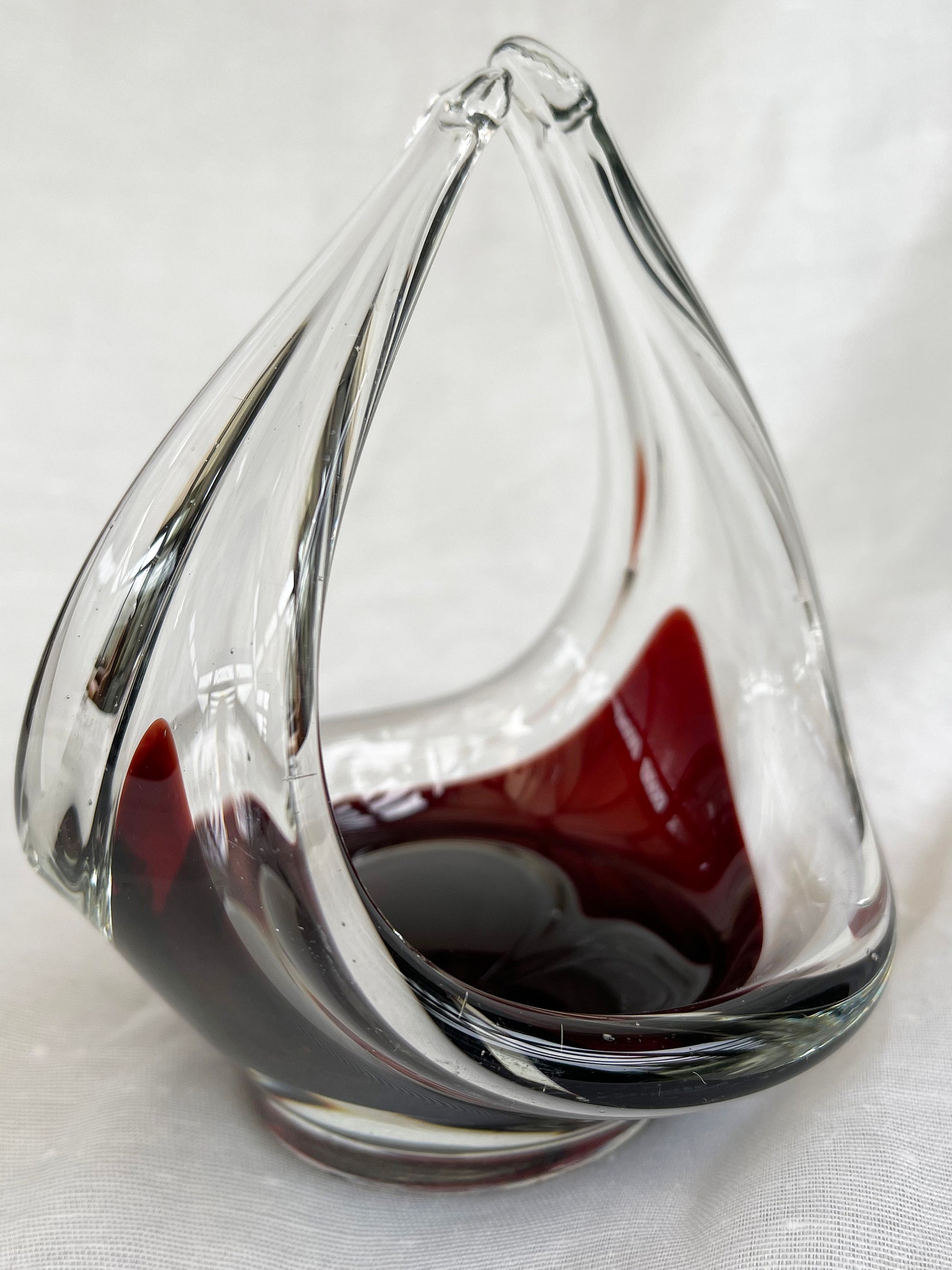 Mid-Century Modern spun and stretched burgundy red glass sculpture/basket/bowl/dish