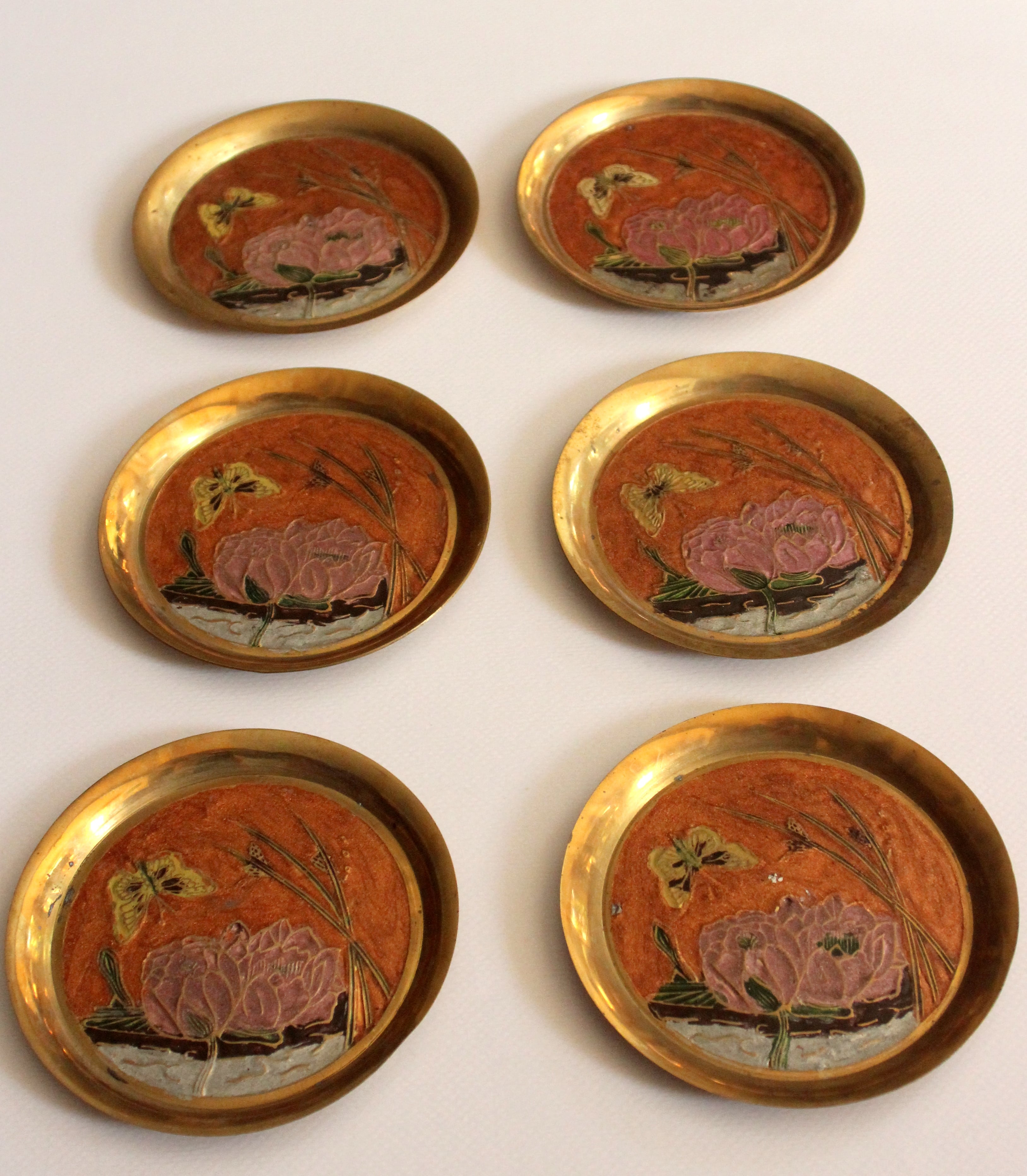 6 brass and cloisonne painted coasters as a set, vintage