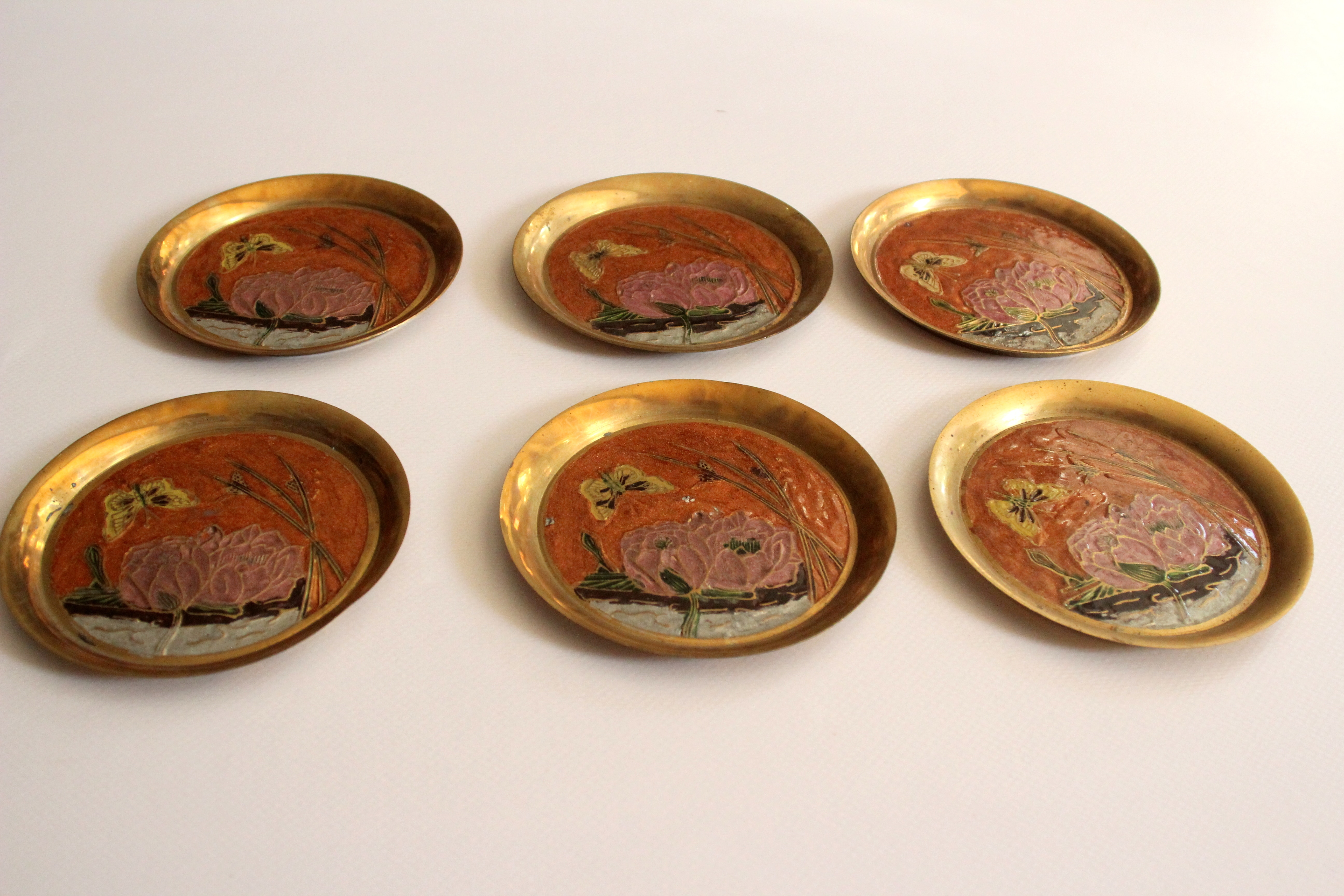 6 brass and cloisonne painted coasters as a set, vintage
