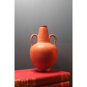Ancient red-ware Roman amphoriskos. Antique terracotta.