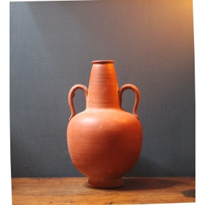 Ancient red-ware Roman amphoriskos. Antique terracotta.