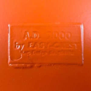 Mid Century Orange Swivel Chair By Easy Crest