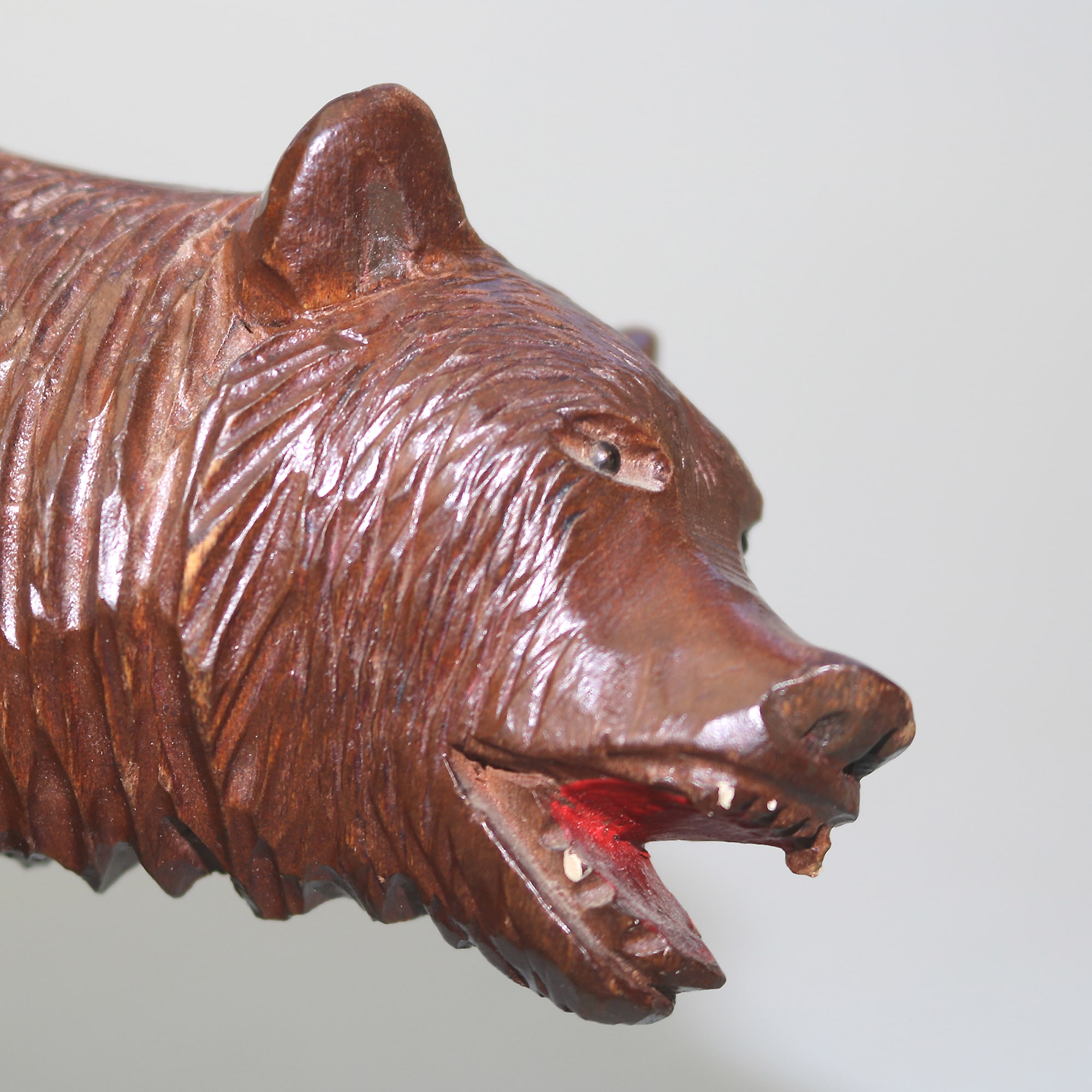 A large antique Swiss Black Forest hand-carved wooden Walking Bear C.20thC