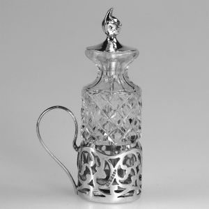 An antique solid silver & cut glass novelty Devil Cayenne Pepper Bottle C.1915