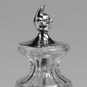 An antique solid silver & cut glass novelty Devil Cayenne Pepper Bottle C.1915