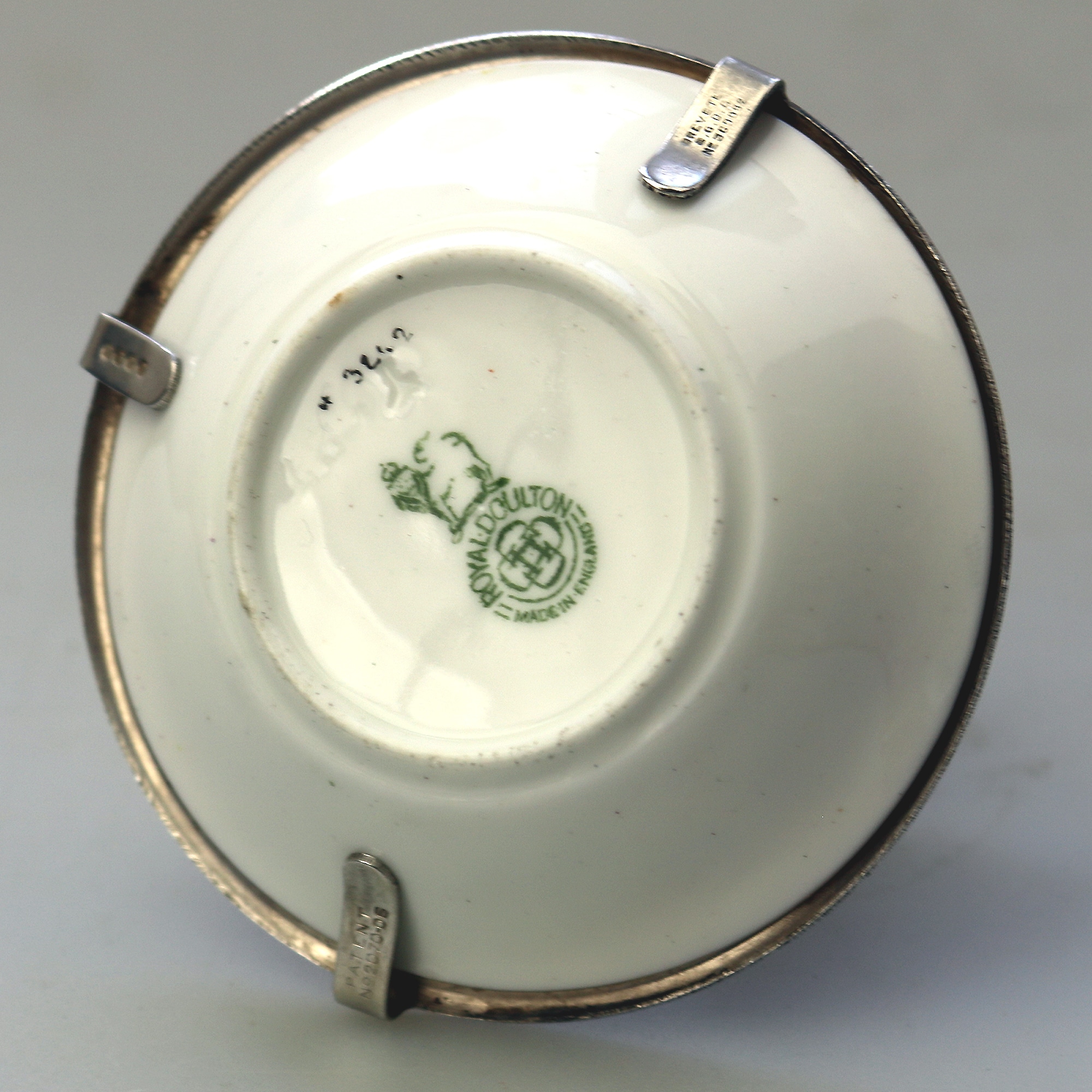 A Christopher Dresser antique novelty Egg Cup & Saucer by Hukin & Heath C.1900's