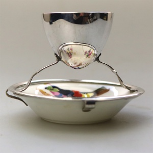 A Christopher Dresser antique novelty Egg Cup & Saucer by Hukin & Heath C.1900's
