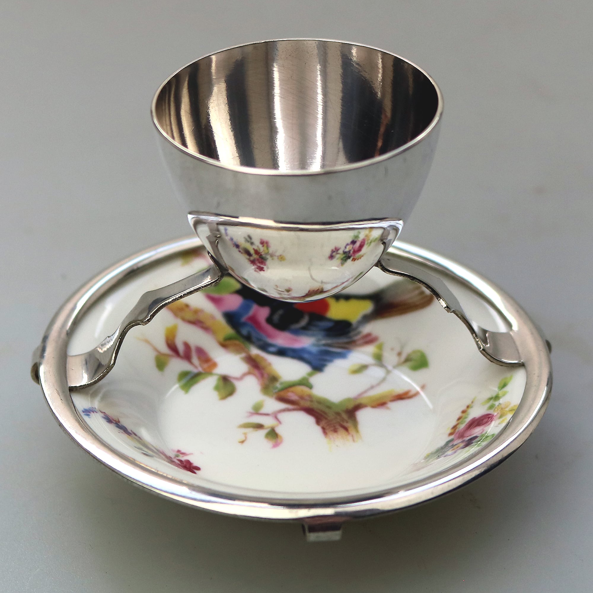 A Christopher Dresser antique novelty Egg Cup & Saucer by Hukin & Heath C.1900's
