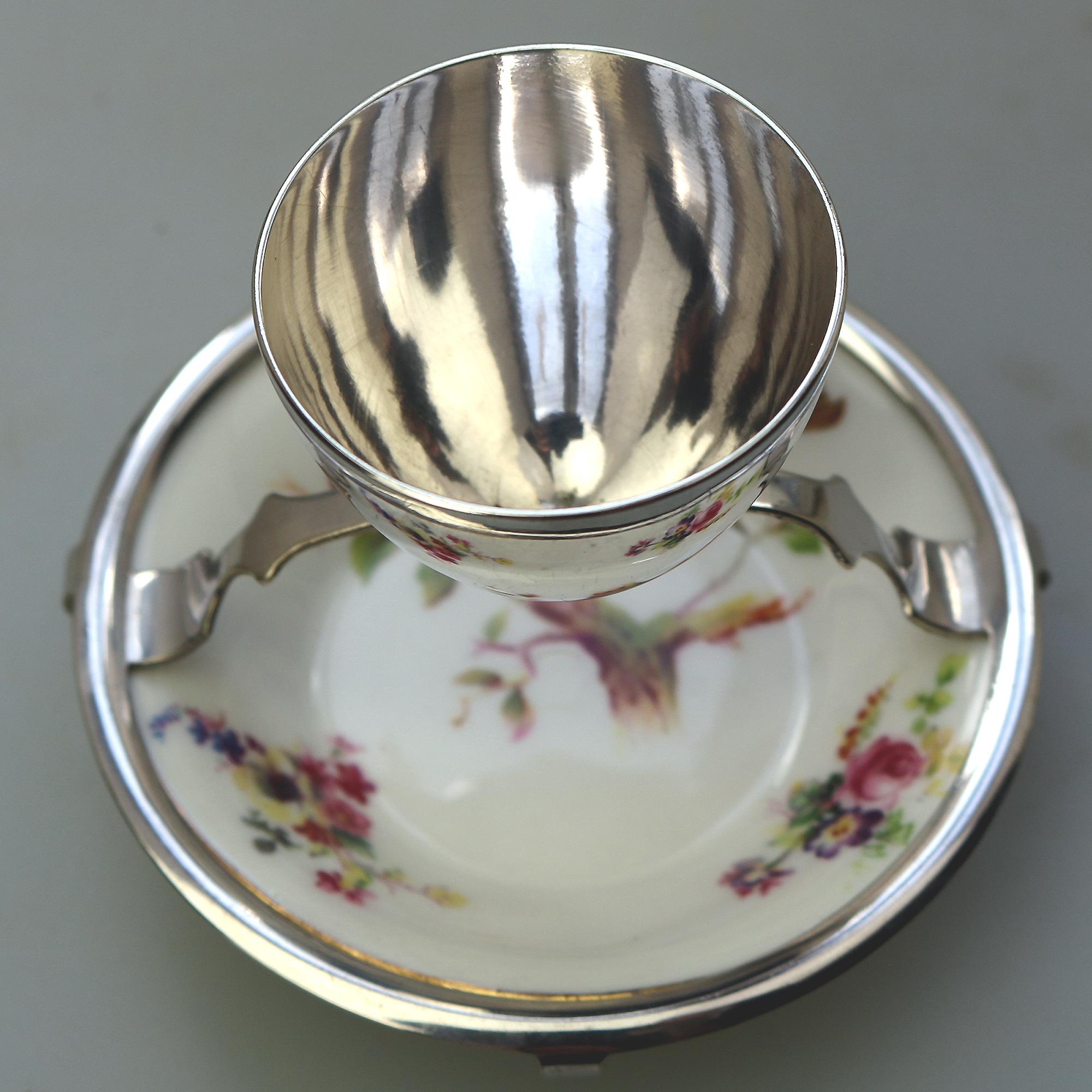 A Christopher Dresser antique novelty Egg Cup & Saucer by Hukin & Heath C.1900's