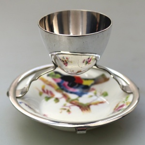 A Christopher Dresser antique novelty Egg Cup & Saucer by Hukin & Heath C.1900's