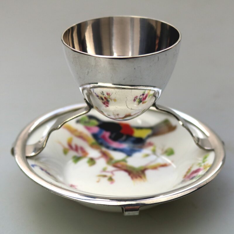 A Christopher Dresser antique novelty Egg Cup & Saucer by Hukin & Heath C.1900's