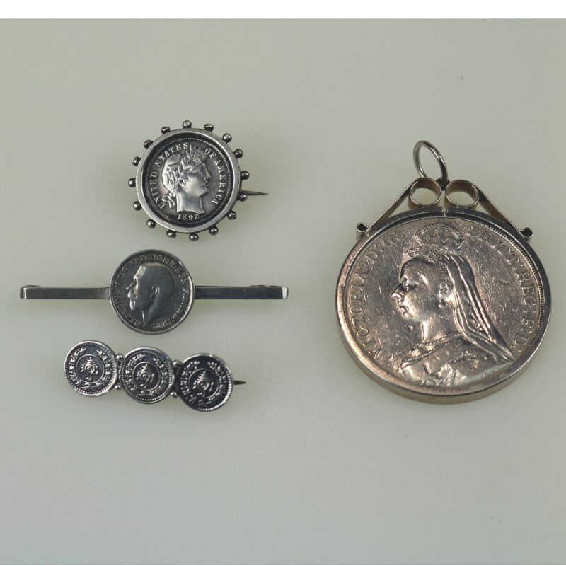 A collection of antique silver Coin Jewellery pendant & Brooches of various dates