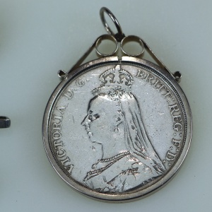 A collection of antique silver Coin Jewellery pendant & Brooches of various dates