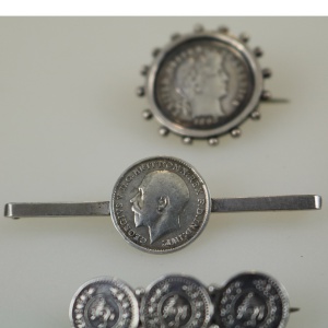 A collection of antique silver Coin Jewellery pendant & Brooches of various dates