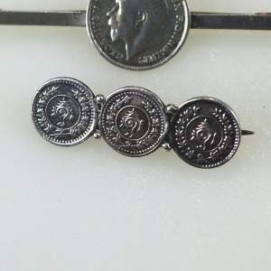 A collection of antique silver Coin Jewellery pendant & Brooches of various dates