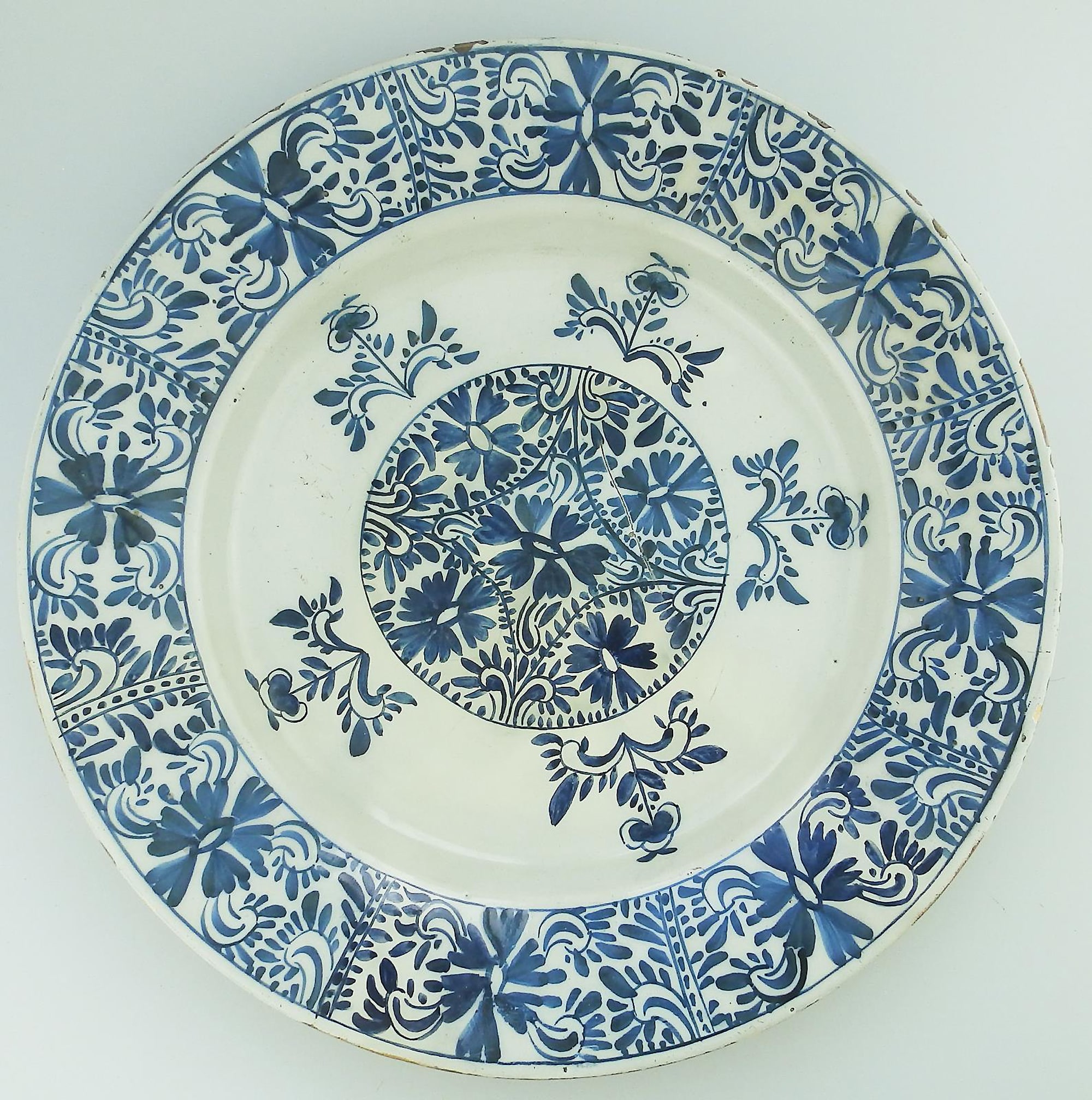 An unusual antique Georgian hand-painted Dutch Delft pottery Charger C.18thC