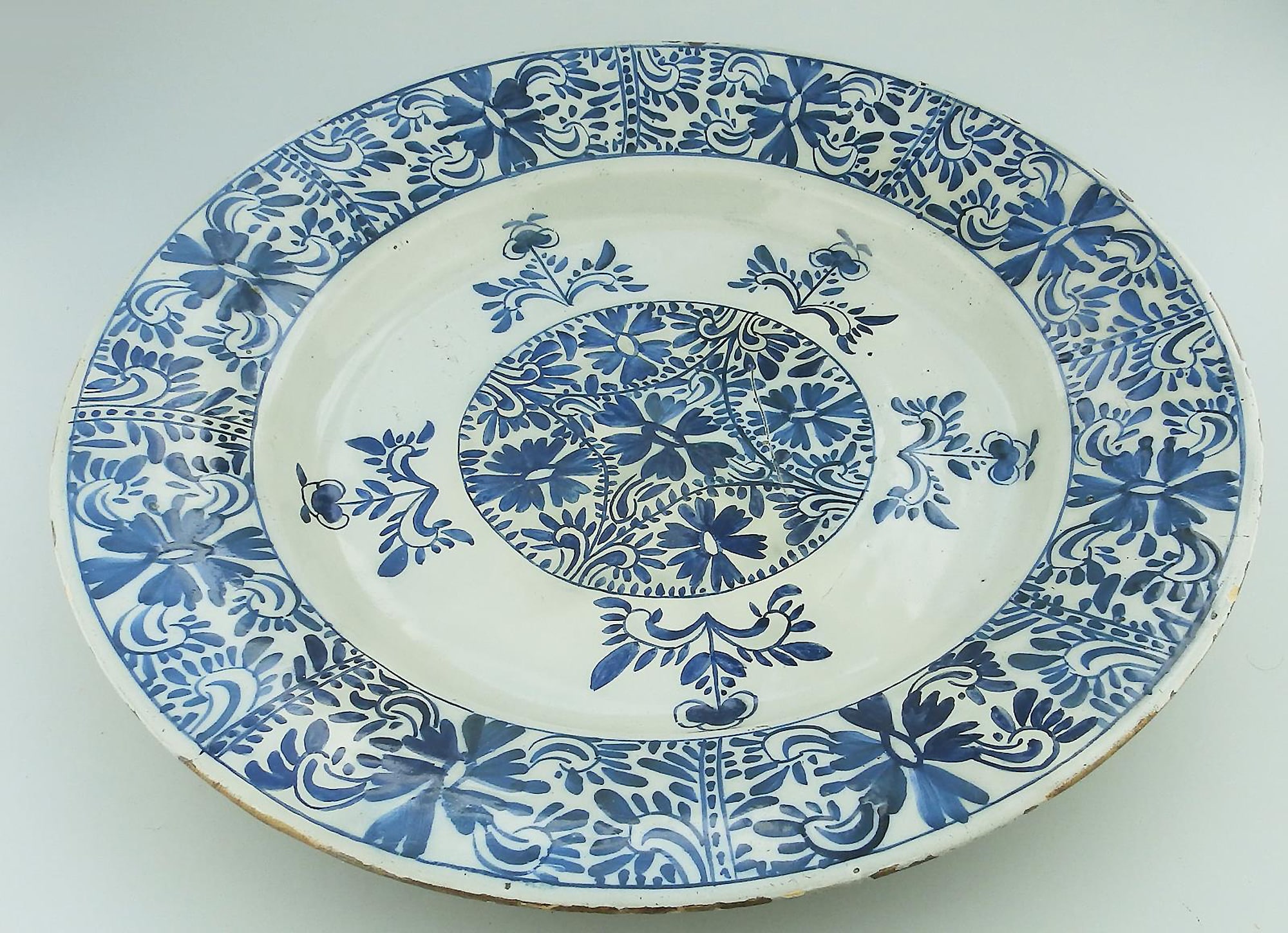 An unusual antique Georgian hand-painted Dutch Delft pottery Charger C.18thC