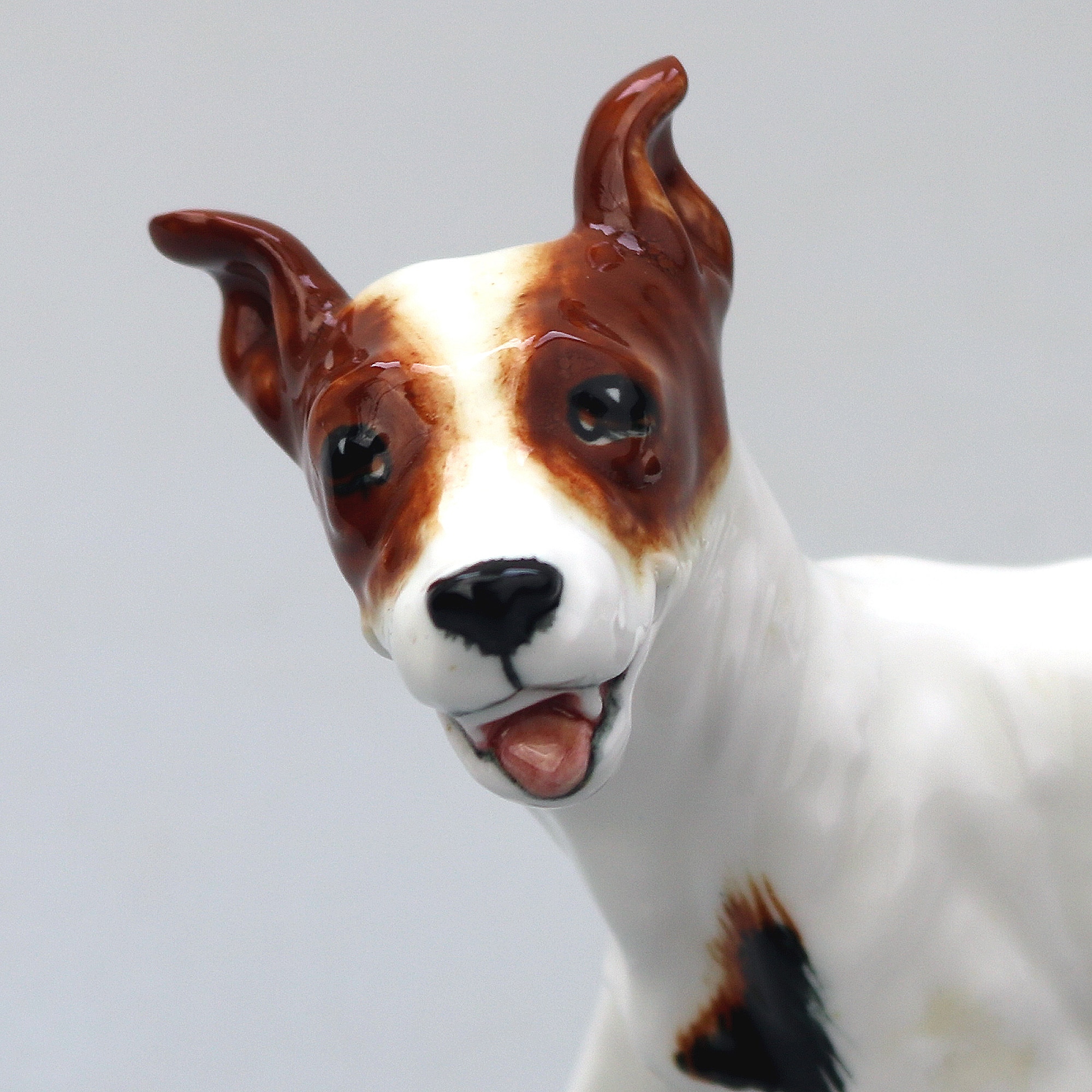 A scarce Royal Doulton porcelain standing Bull Terrier Dog Figurine HN 1100 C.1934