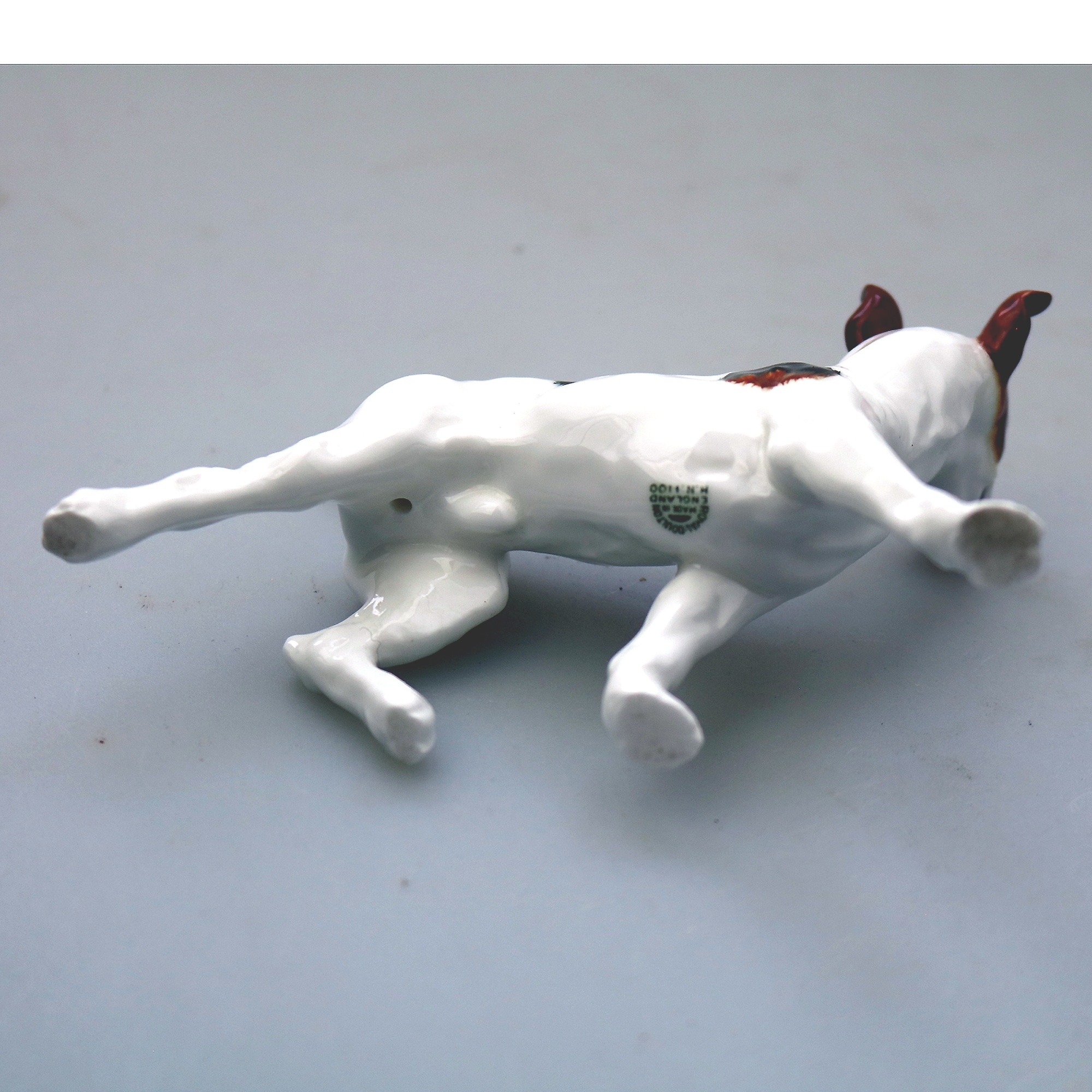 A scarce Royal Doulton porcelain standing Bull Terrier Dog Figurine HN 1100 C.1934