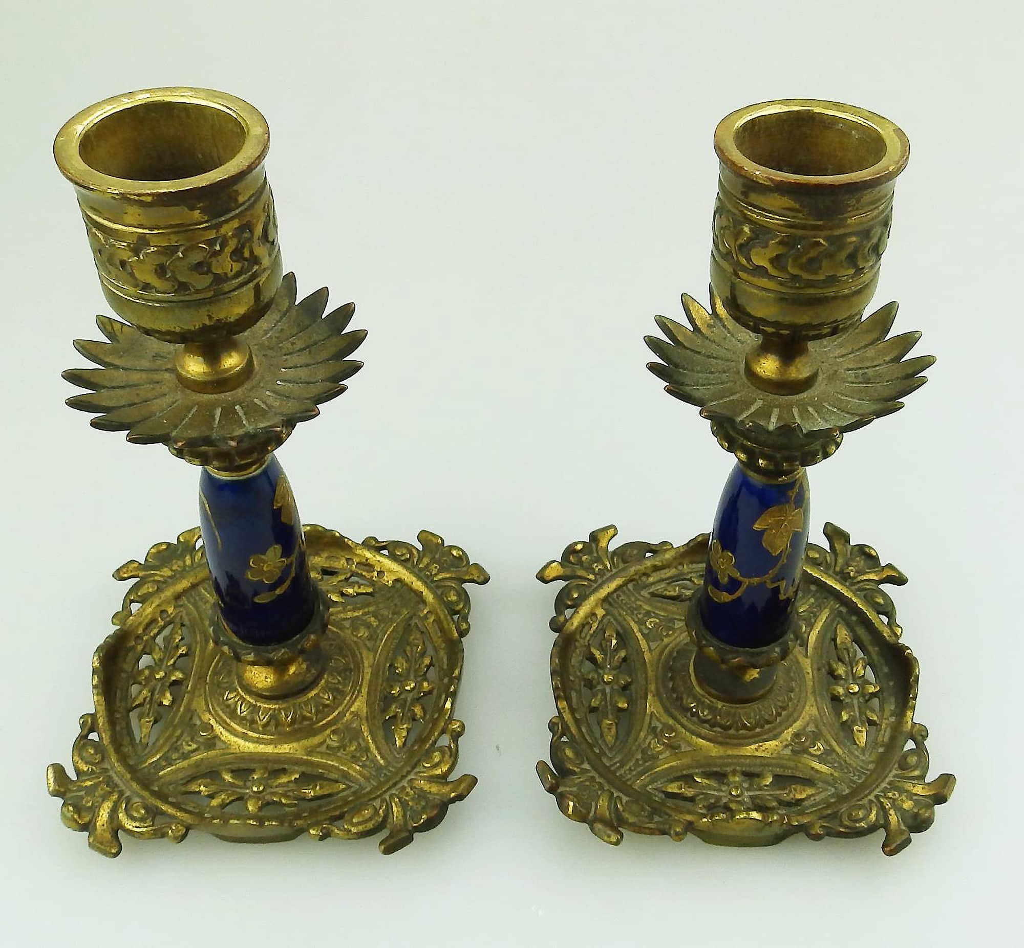 An unusual pair of antique designer gilt & porcelain inlaid Candlesticks C.19thC