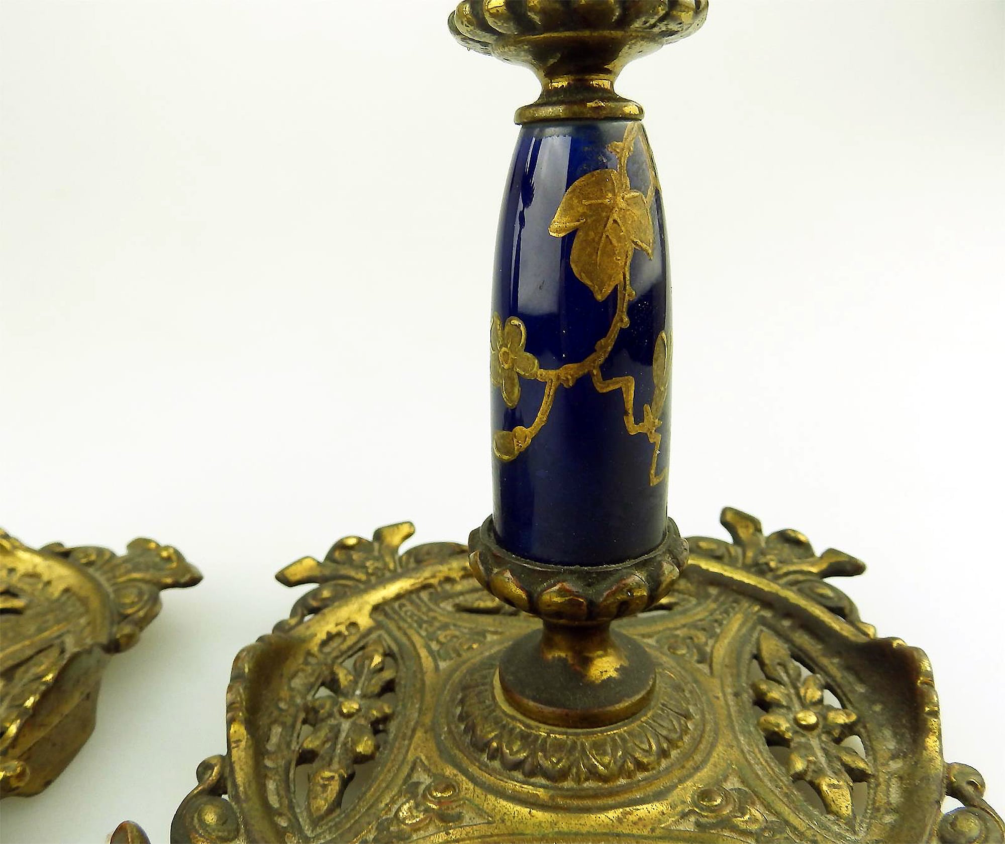 An unusual pair of antique designer gilt & porcelain inlaid Candlesticks C.19thC