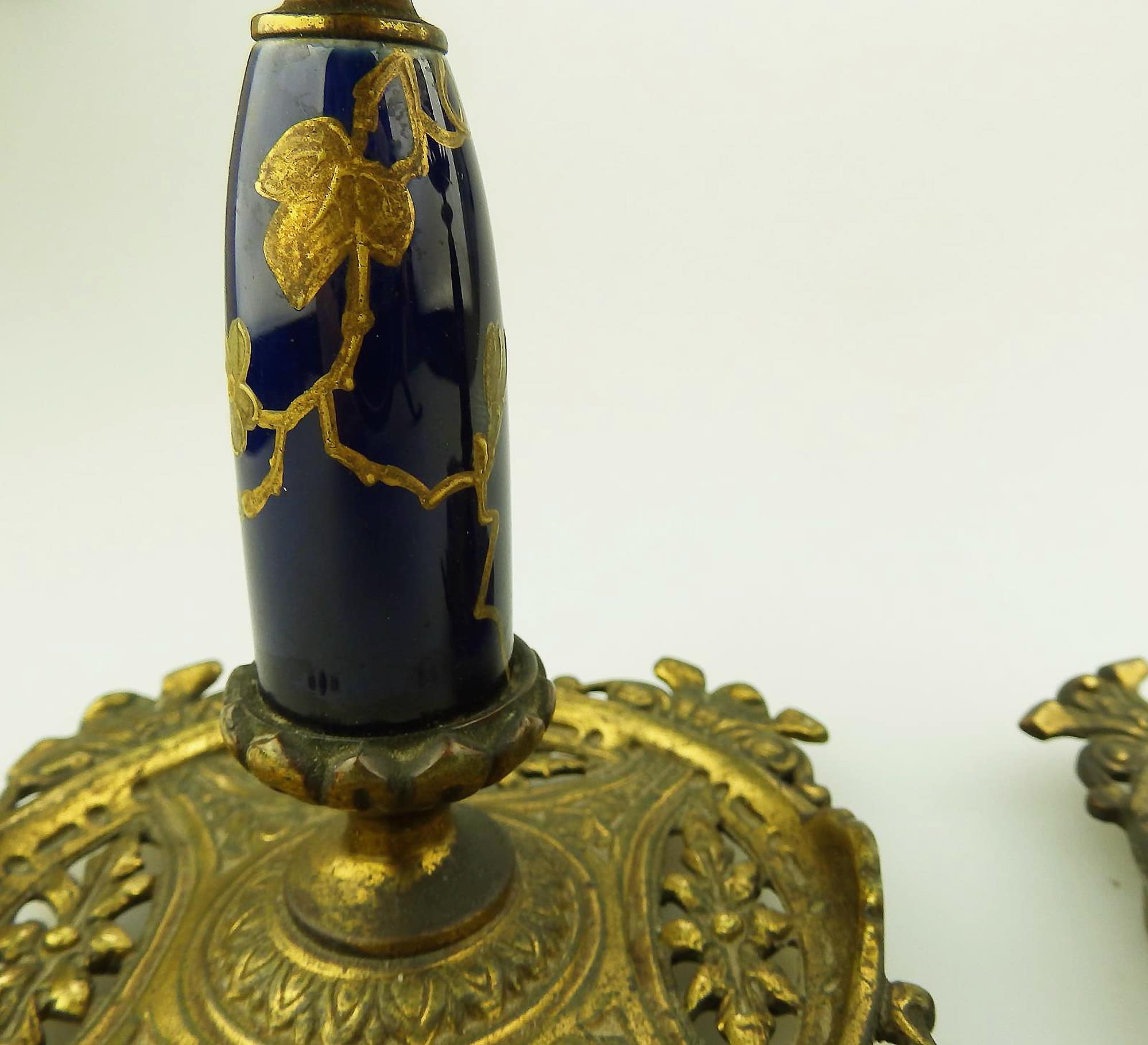 An unusual pair of antique designer gilt & porcelain inlaid Candlesticks C.19thC