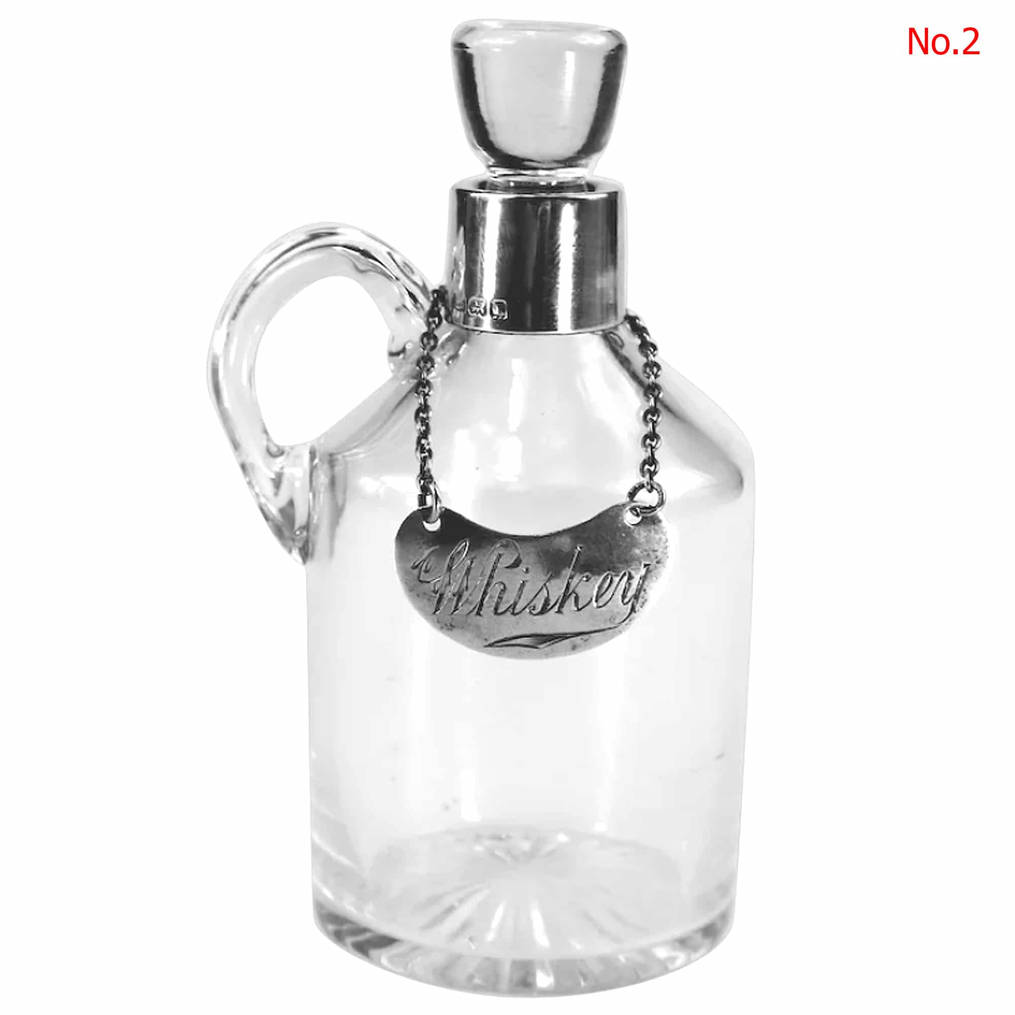 An antique novelty English solid silver & blown glass Whiskey Noggin C.1908