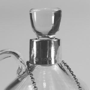 An antique novelty English solid silver & blown glass Whiskey Noggin C.1908