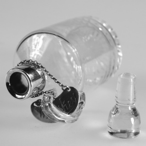 An antique novelty English solid silver & blown glass Whiskey Noggin C.1908