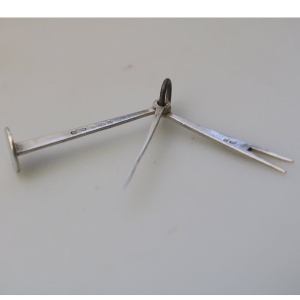 An antique English solid silver novelty pipe tamper & picks tools C.1903