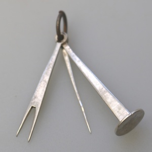 An antique English solid silver novelty pipe tamper & picks tools C.1903