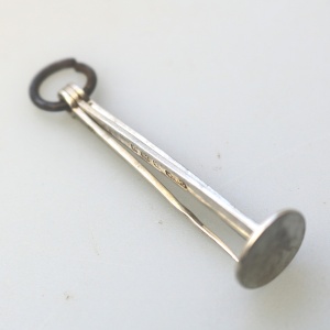 An antique English solid silver novelty pipe tamper & picks tools C.1903