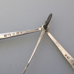 An antique English solid silver novelty pipe tamper & picks tools C.1903