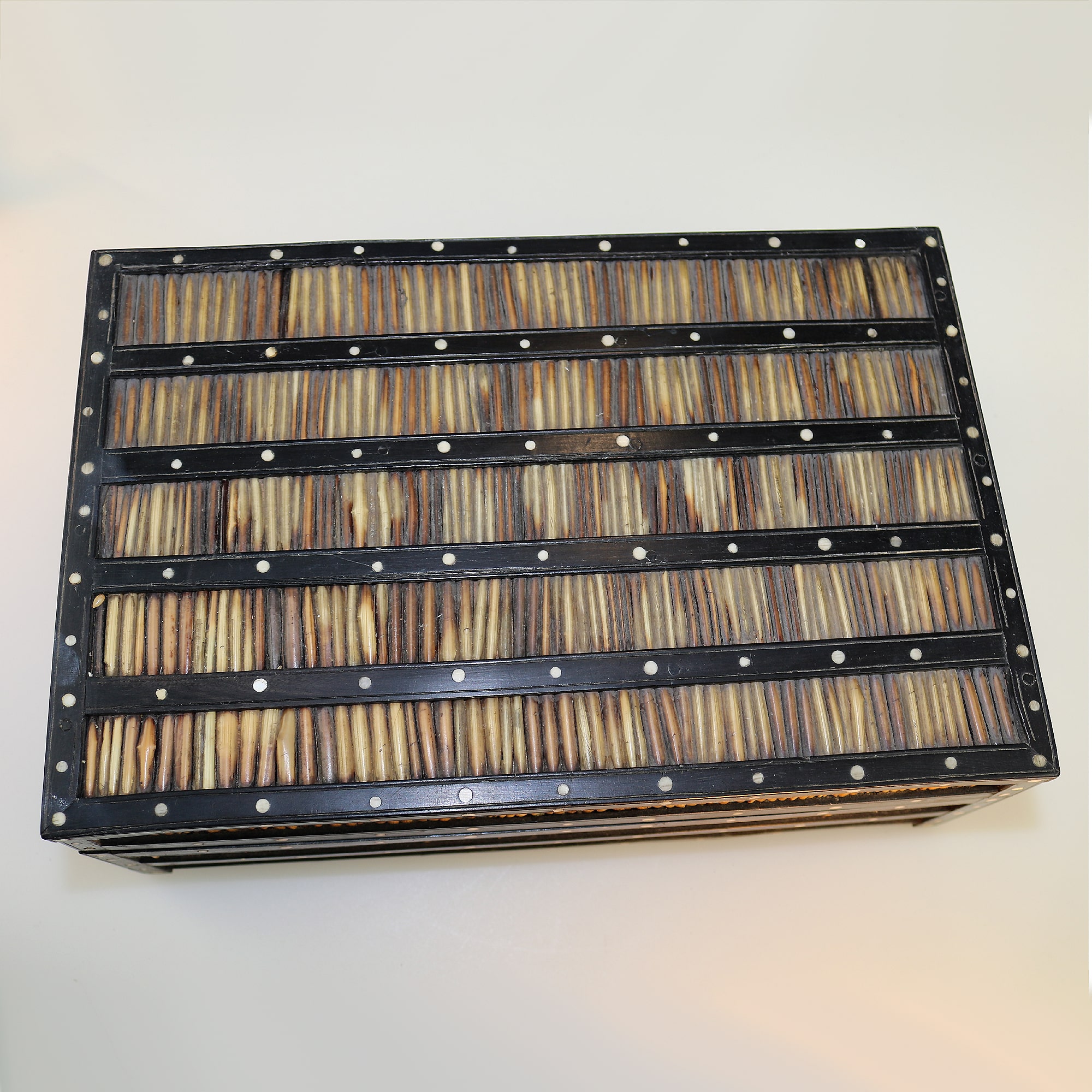 An antique Sinhalese porcupine quill & ebony fitted Workbox C.19thC