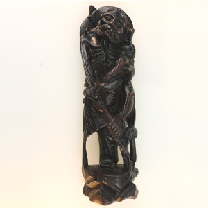 A large antique Chinese silver inlaid hardwood carved Warrior Figurine C.19thC